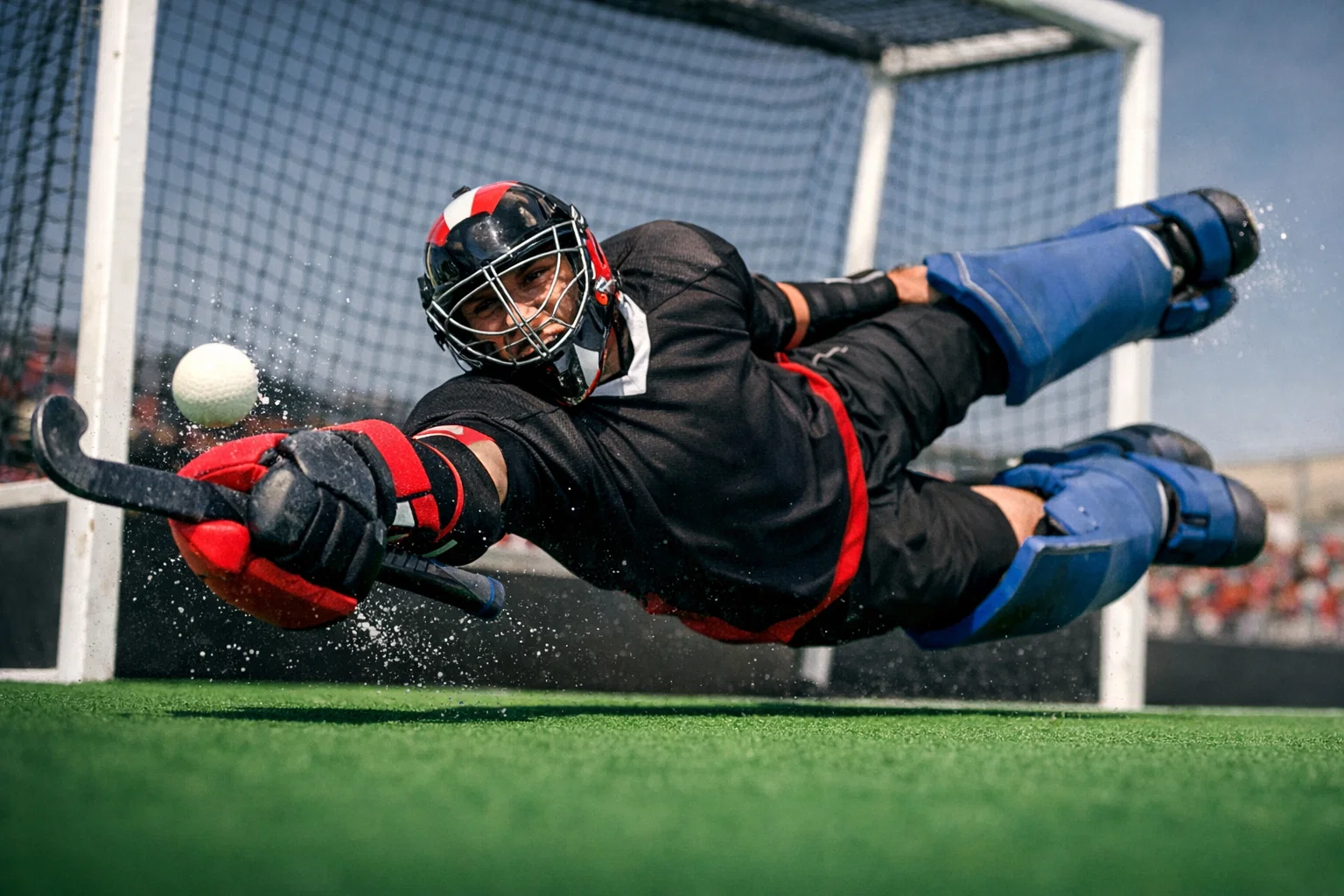 Hockeykeeper maakt een spectaculaire redding tijdens een shoot-out